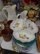 Various Staffordshire jugs, cabbage leaf plates etc