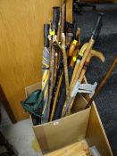 A parcel of various walking sticks, umbrellas etc