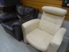 A retro ivory leather reclining armchair together with a chocolate brown leather Danway armchair