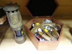 Boxed Sexton together with a blue glass miner's lamp by Hailwoods