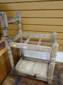 A bleached pine umbrella stand