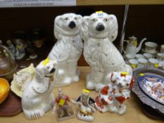 A pair of Staffordshire dogs together with two smaller dogs & two Staffordshire figures
