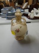 A Royal Worcester twin-handled blush ivory vase dated 1887