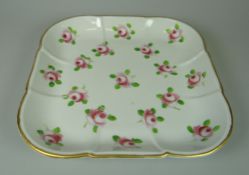 A (BELIEVED) SWANSEA PORCELAIN CRUCIFORM SQUARE DISH painted with scattered open pink roses within a
