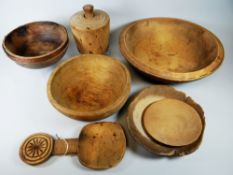 A PARCEL OF WELSH FARMHOUSE TREEN including butter-pat, butter scoop and bowls Provenance: by