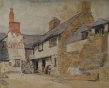 ENGLISH SCHOOL watercolour - historic buildings Machynlleth with figure washing, inscribed verso '