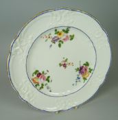 A NANTGARW PORCELAIN PLATE, London decorated by Mortlock's of Oxford Street and being of lobed