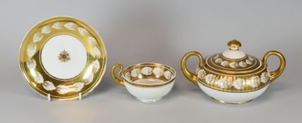 A SWANSEA PORCELAIN PARIS FLUTE SUCRIER, CUP & SAUCER, gilt decorated with a continuous shell motif,