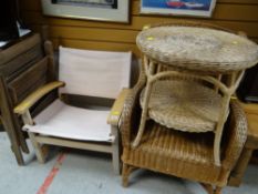 A conservatory wicker armchair & table together with a canvas & lightwood chair etc