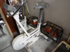 An exercise bike & a petrol generator