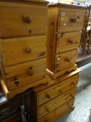 A small three-drawer honey pine chest of drawers together with a pair of matching three-drawer