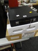 A vintage bar-lock portable typewriter together with a vintage AEG Olympia travel typewriter & a