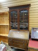A vintage bureau bookcase