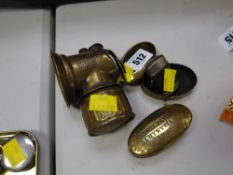 A brass snuff box inscribed Sidney Davies - Llwyn y Pier 1902 together with a Just Right brass cycle