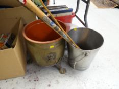 A brass log bin on claw feet, sundry walking sticks etc