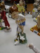 A Royal Worcester figurine 'Young Farmer'