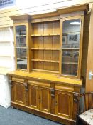 An early twentieth century Welsh dresser with closed base & semi-glazed rack
