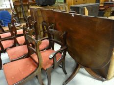 A reproduction twin-pedestal dining table & eight chairs