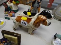 Two Beswick models of standing spaniels
