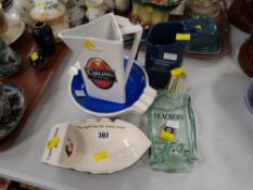 A parcel of brewery pottery & glassware including a Wade ashtray for Captain Morgan's rum