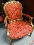 A gilt wood & upholstered French-style salon armchair