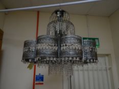 A fancy elaborate drop lustre ceiling chandelier