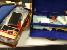A Masonic parcel including silver gilt medal, gloves etc contained in two leather cases