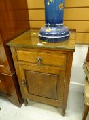 A vintage polished night cabinet
