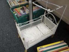 A child's painted cast iron vintage cot