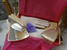 A set of vintage ladies gloves & a dressing table set
