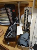 Three vintage blood pressure gauges