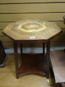 An hexagonal marquetry two-tier occasional table