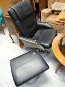A modern leather recliner chair & footstool