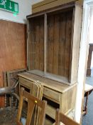 A lightwood dresser with glass doors (for assembly)