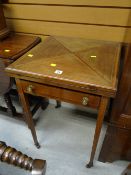 An Edwardian inlaid mahogany envelope card table with baize lining