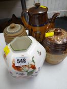 Four items of Royal Doulton comprising two tobacco jars, coffee pot & vase