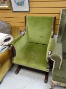 An unusual nineteenth century mahogany armchair in green upholstery