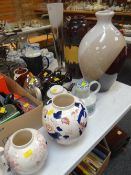 A modern pottery bulbous vase, a West German pottery vase & another, sundry teapots, Masons