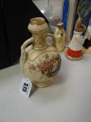 A twin-handled Royal Worcester blush ivory vase