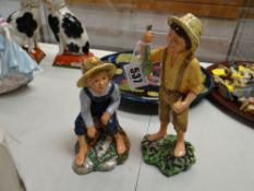 A Royal Doulton figurine 'Huckleberry Finn - HN2927' together with 'Tom Sawyer - HN2926'
