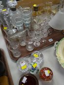 A quantity of glassware including paperweights, lead crystal glasses, a dimple scotch whisky