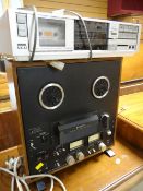 A Sony three-head stereo tape corder & an Akai stereo system