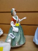 A Royal Doulton figurine 'Christmas Day 2000 - HN4242'