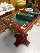 A modern darkwood glass topped Monopoly game table