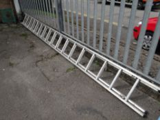 An extending aluminium two-section ladder (outside)