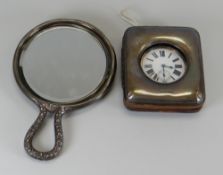 A STERLING SILVER HAND-MIRROR & ENGLISH SILVER WATCH-HOLDER together with a white-metal 'Goliath'