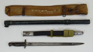 A WWI BAYONET with scabbard together with a J H Steward Ltd sight, 54cms long