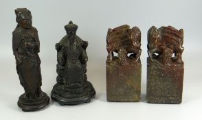 A PAIR OF ORIENTAL MARBLE CREATURES ON PLINTHS in the archaic style, together with two Oriental