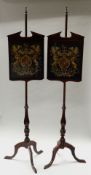 A PAIR OF POLE SCREENS with adjustable panels on long tripod pole supports, both panels with