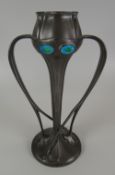 A SOLKETS FOR LIBERTY PEWTER TULIP-SHAPED VASE in the Art Nouveau style with four enamel medallions,